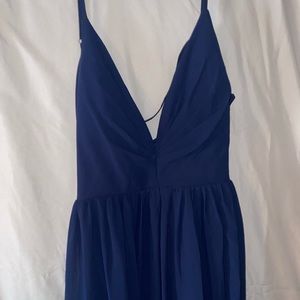 Navy blue long dress, left slit in leg.